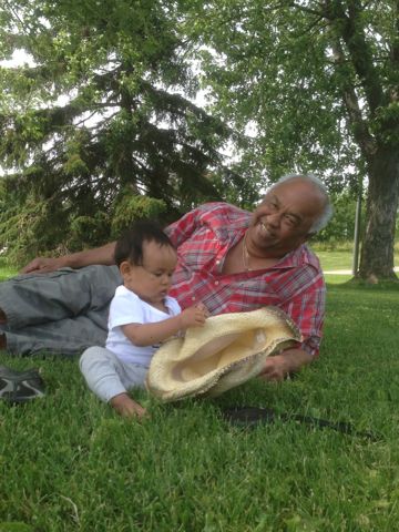 On the grass with the baby