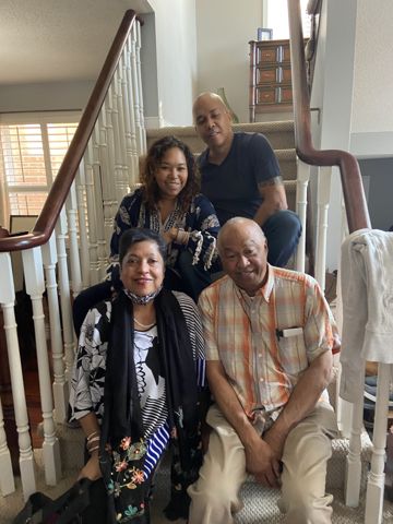 On the stairs — the whole crew